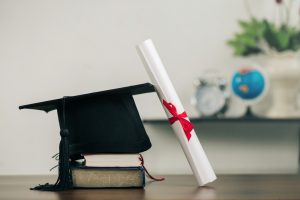 graduation hat with a scroll