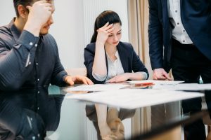 two people looking at custody papers