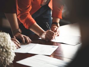 person signing a will