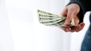 a person holding money